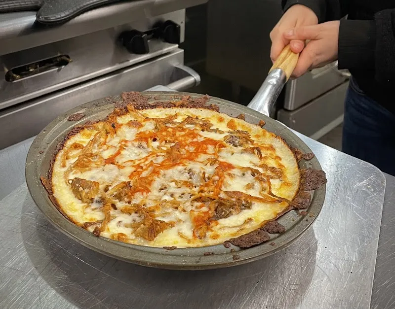 Interior de Latino’s Pizzería